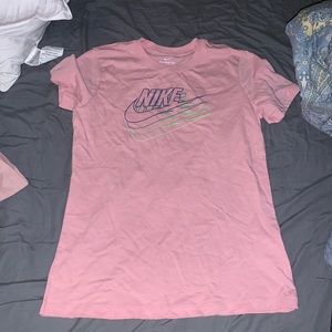 Pink Nike graphic tee, women’s size S. Never worn